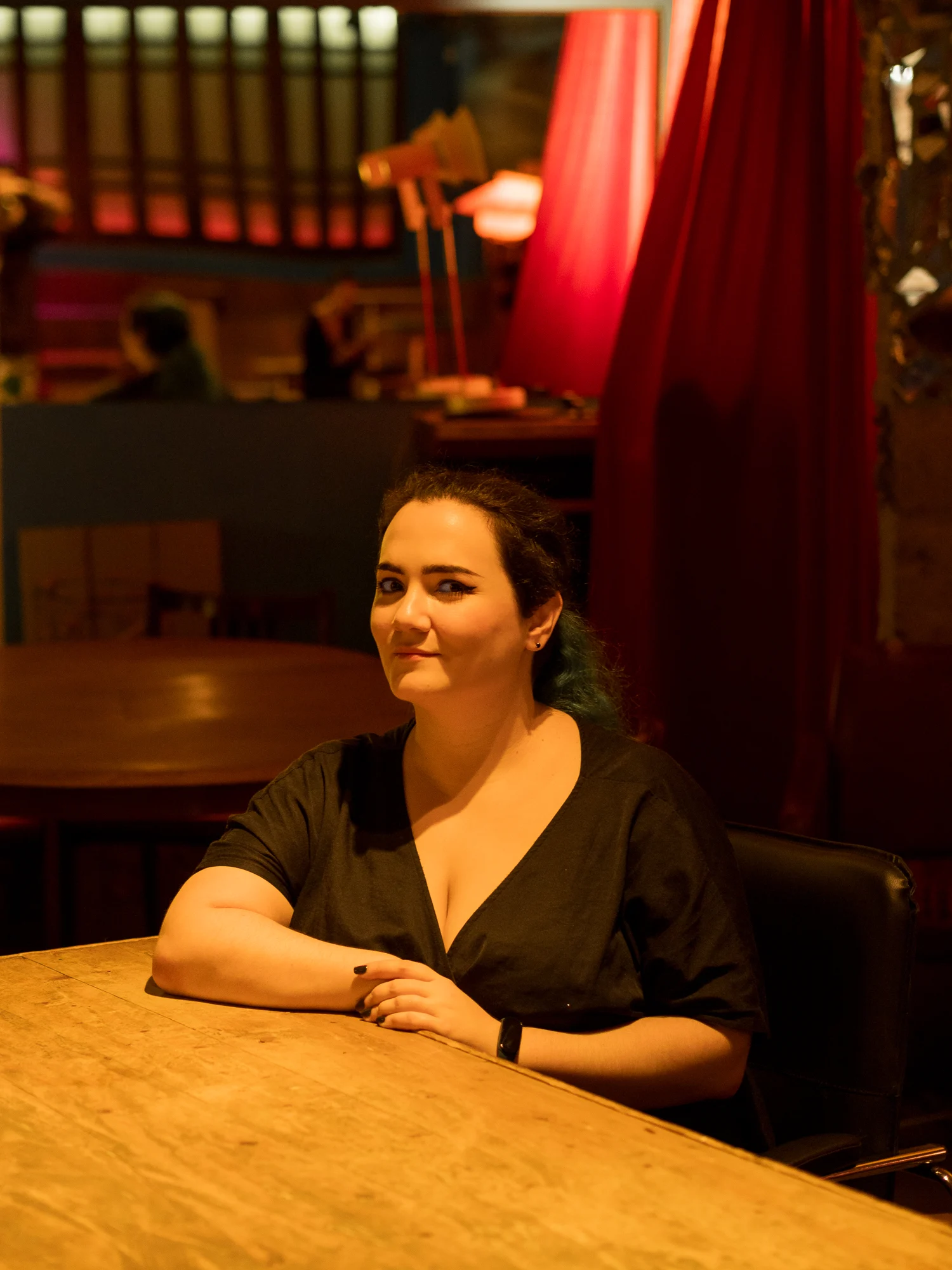 Maia Stanis sitting at a table